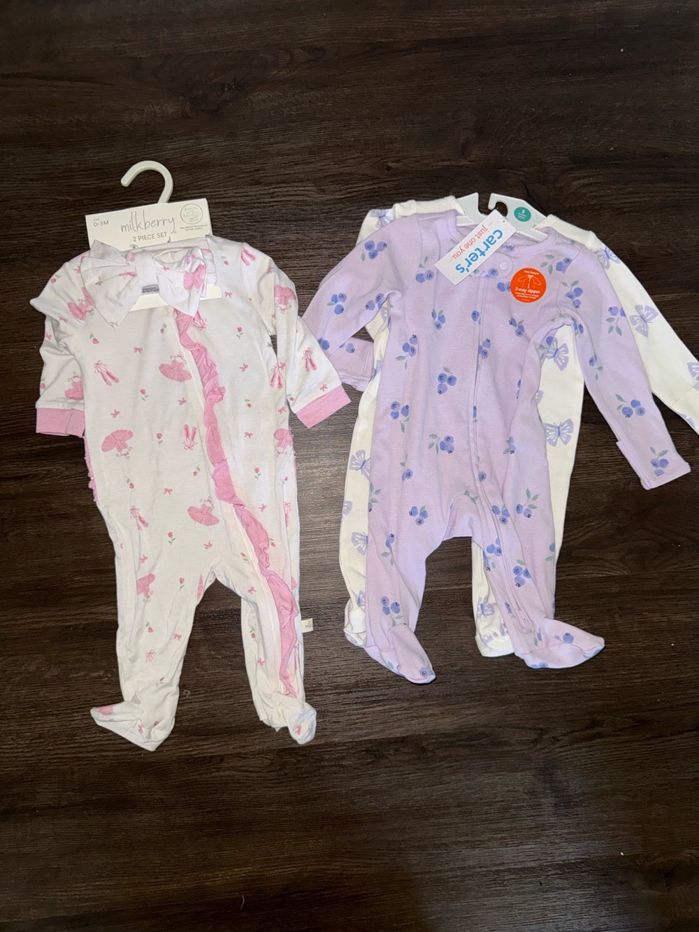 NWT Baby girl bundle- 3 long sleeve and footie 2 way zipper onesies